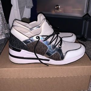 Used Michael Kors sneakers size 11